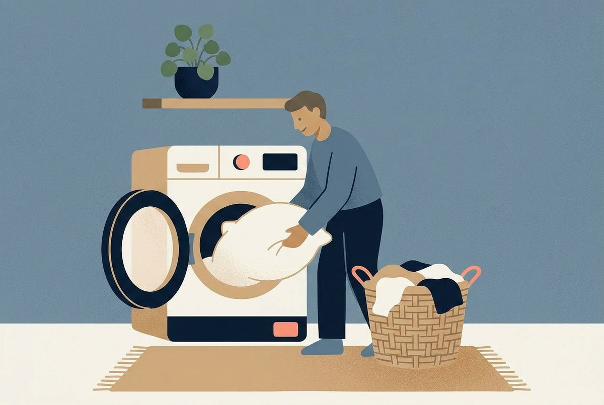 Illustration of a person loading a pillow into a front-load washing machine